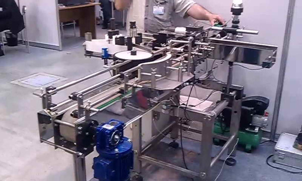 Этикетироваочный аппарат с бракеражем на базе ПЛК Delta DVP-SS2
